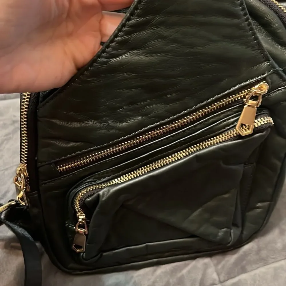 Sol and Solene on the Go Sling Backpack Dark Green with Gold Metal Accents